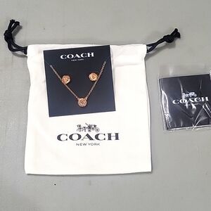 Coach rose gold, floral necklace and matching earrings. BNWT